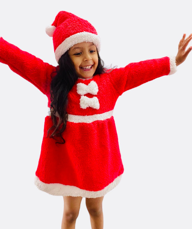 Full length, happy girl with Santa outfit with hat